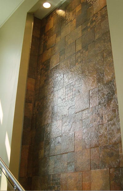 A wall with many different types of tiles.