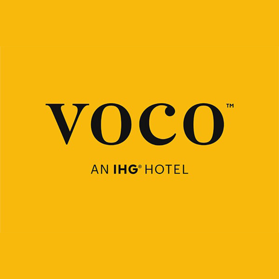 A yellow background with the word " voco ".