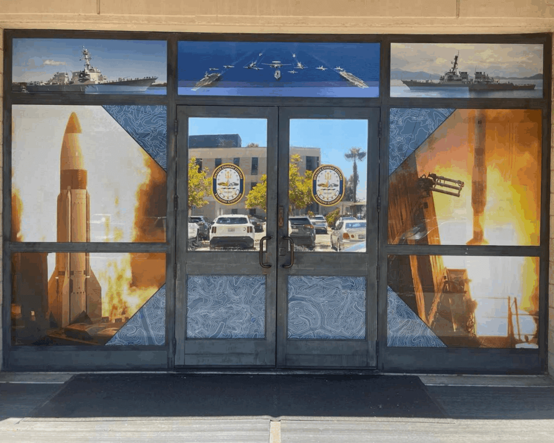 Glass doors painted with naval and rocket imagery