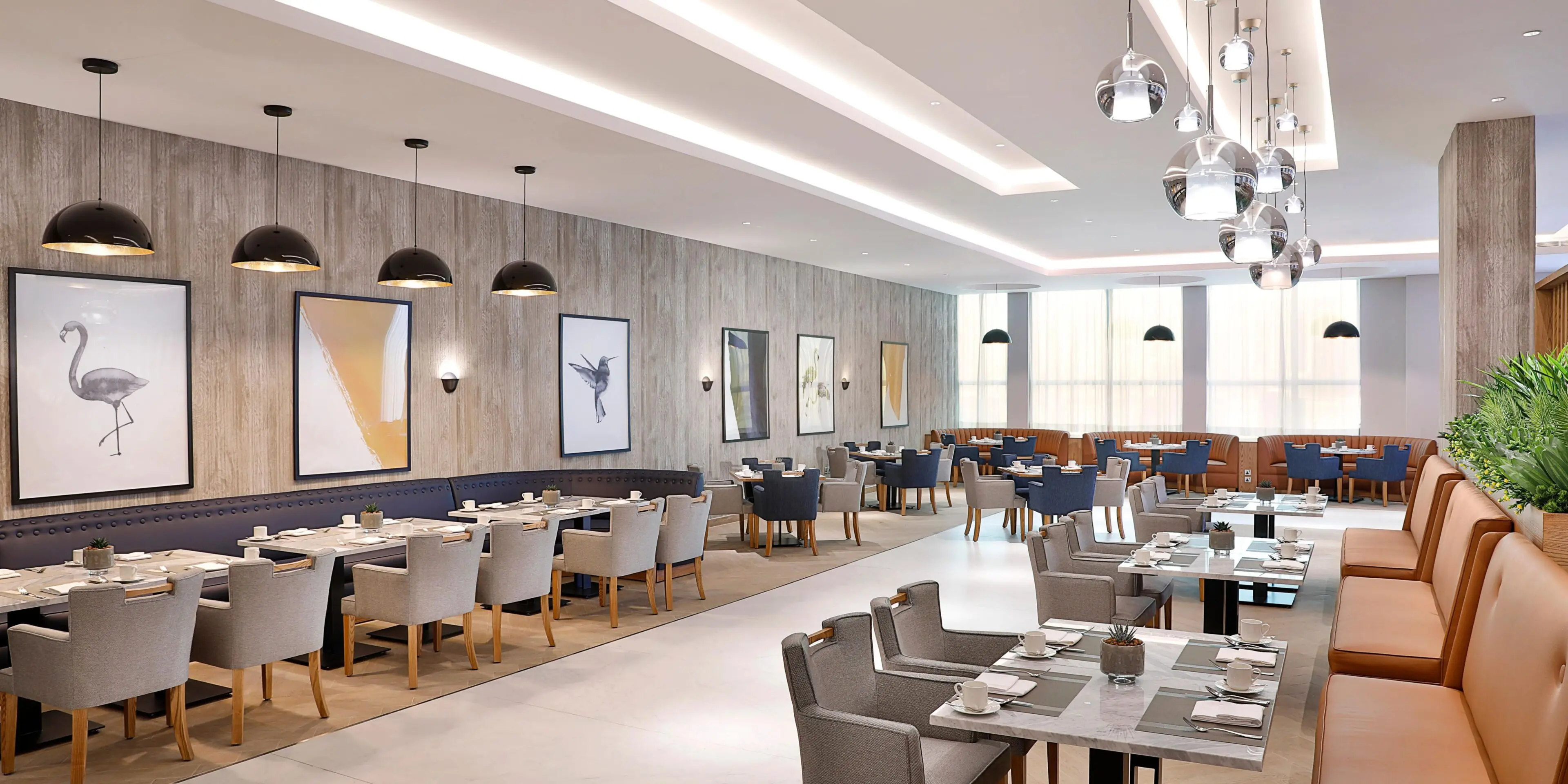 Modern restaurant interior with elegant dining setup.
