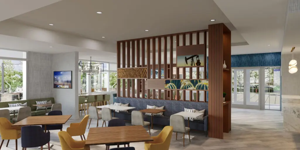 Modern lounge area with wooden partition and comfortable seating.