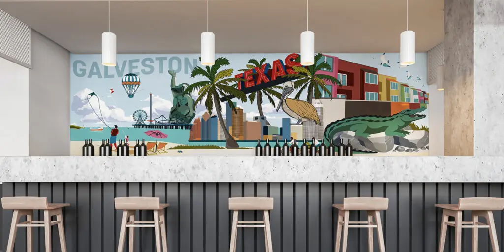 A modern bar area with stools and a Texas-themed decor.